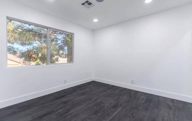 Bedroom with Dark Hardwood Floor