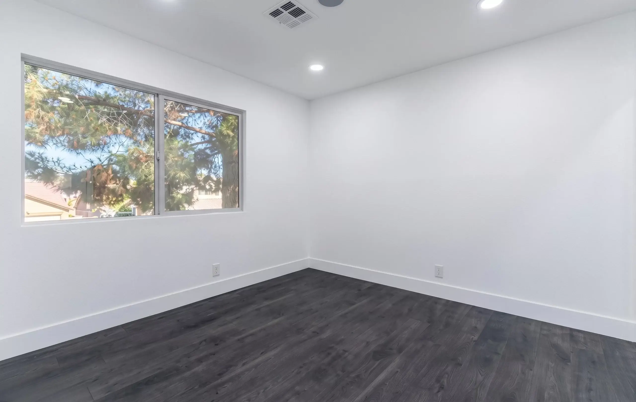 Bedroom with Dark Hardwood Floor